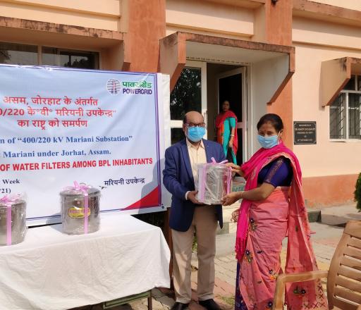 Distribution of water filters among BPL inhabitants at New Mariani substation by POWERGRID